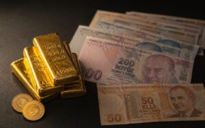 Gold bars and Turkish lira banknotes side by side, illustrating why Turkey sold its gold reserves to defend its currency.