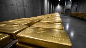 Rows of 400oz gold bars stacked in a central bank vault