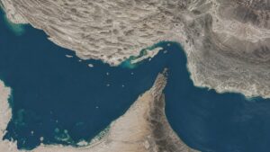 Satellite view of the Strait of Hormuz — the chokepoint at the center of the gold price Hormuz tanker strike story.