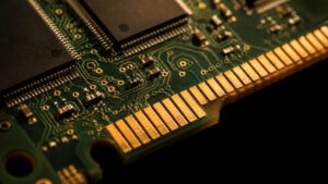 Gold-plated edge connectors on a circuit board — AI server components are a growing source of gold demand in 2026