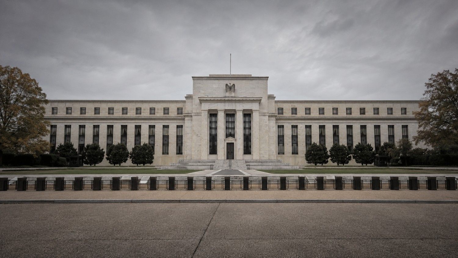 Federal Reserve Eccles Building under overcast skies, Washington D.C. — gold price FOMC minutes release July 8, 2026