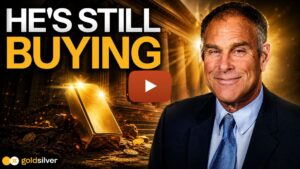 Rick Rule of GoldSilver next to a gold bar and coins, illustrating why saving in gold is a good idea for long-term investors