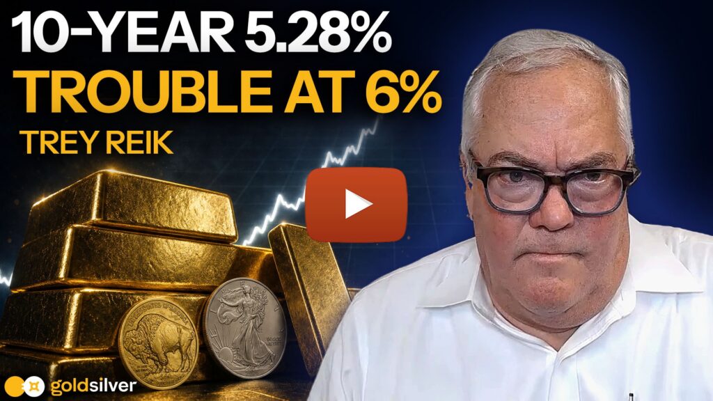 GoldSilver Show video thumbnail with Trey Reik beside stacked gold bars and coins, an upward-trending price chart, and the text "10-Year 5.28%, Trouble at 6%."