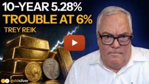 GoldSilver Show video thumbnail with Trey Reik beside stacked gold bars and coins, an upward-trending price chart, and the text "10-Year 5.28%, Trouble at 6%."