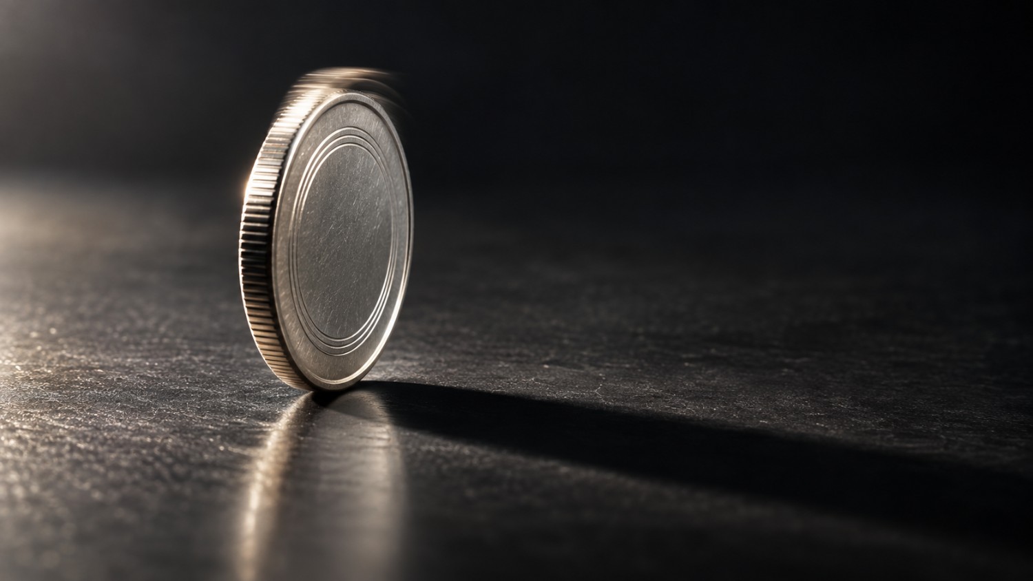 Silver price outlook September 2026: a silver coin balanced on its edge, caught mid-wobble, illustrating a Fed rate decision that's priced in while the market beneath it is still finding its footing.