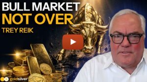 Trey Reik beside a golden bull statue and stacked gold bars, title card reads “Bull Market Not Over,” GoldSilver Show video thumbnail on gold’s pullback below $4,000.